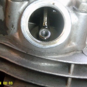 Exhaust side of valve, no screw, or nut.