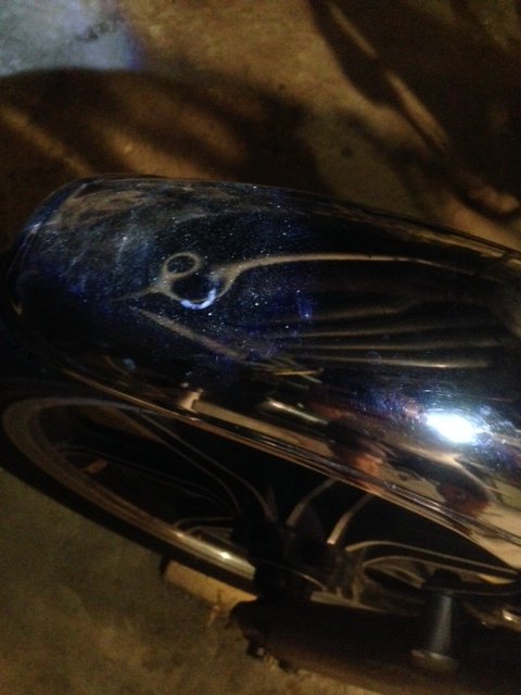 Front fender. This is the dent located towards the front of the fender.